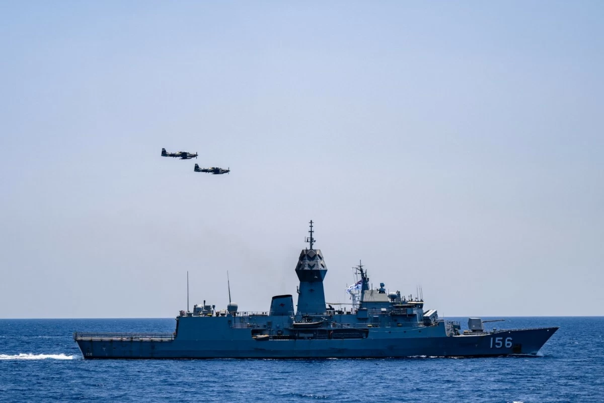 Two A-29B Super Tucano aircraft of the Philippine Air Force execute a flyby over the formation, demonstrating close air support integration, during the 16th Multilateral Maritime Cooperative Activity (MMCA). (Photo: Armed Forces of the Philippines)