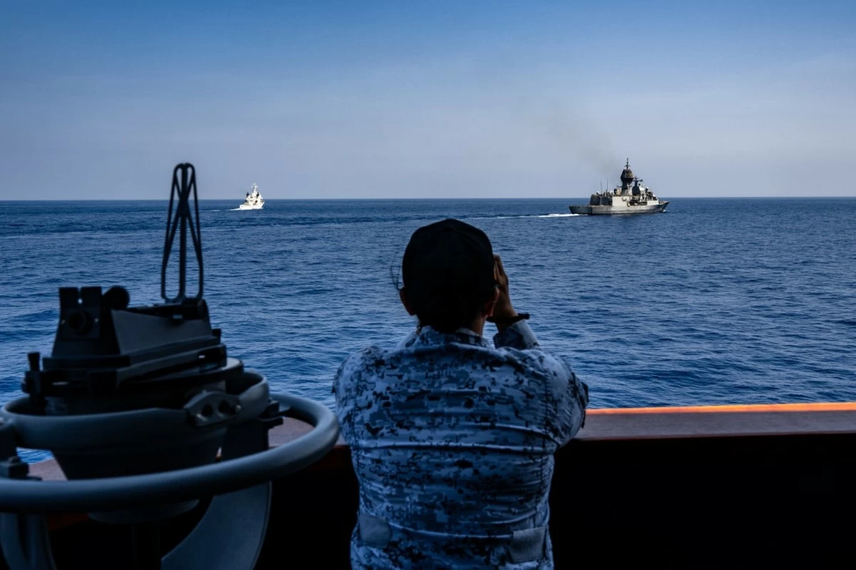 A Philippine Navy personnel aboard BRP Rajah Sulayman (PS20) executes an Officer of the Watch (OOW) Manning Exercise while participating vessels conduct division tactics and coordinated maneuvering at sea during the Multilateral Maritime Cooperative Activity (MMCA). (Photo: Armed Forces of the Philippines)