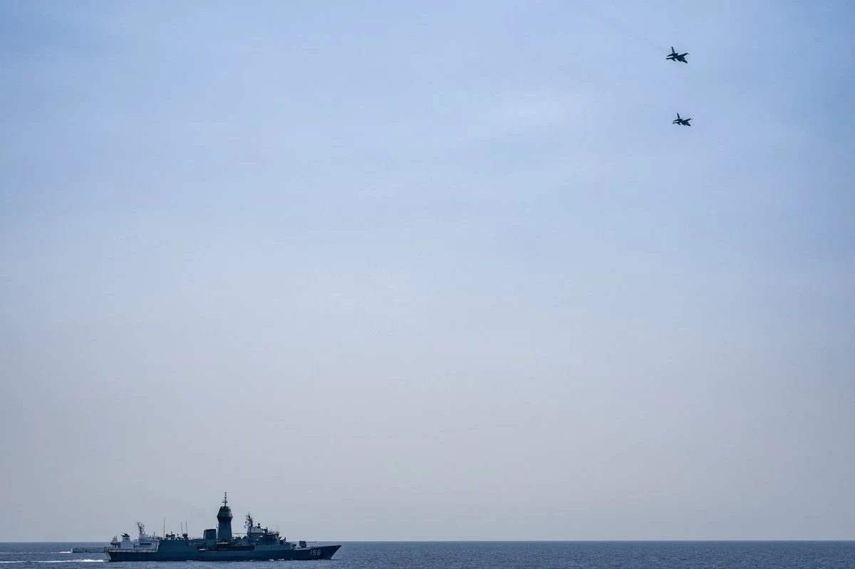 Philippine Air Force FA-50 fighter jets perform a flyby over participating vessels, showcasing air-maritime integration, during the Multilateral Maritime Cooperative Activity (MMCA). (Photo: Armed Forces of the Philippines)