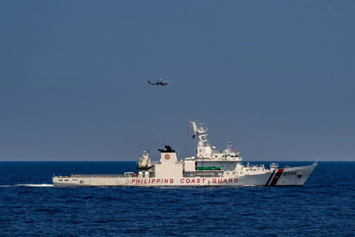 An MH-60R Seahawk conducts a Photo Exercise, documenting coordinated naval operations at sea, during the Multilateral Maritime Cooperative Activity (MMCA). (Photo: Armed Forces of the Philippines)