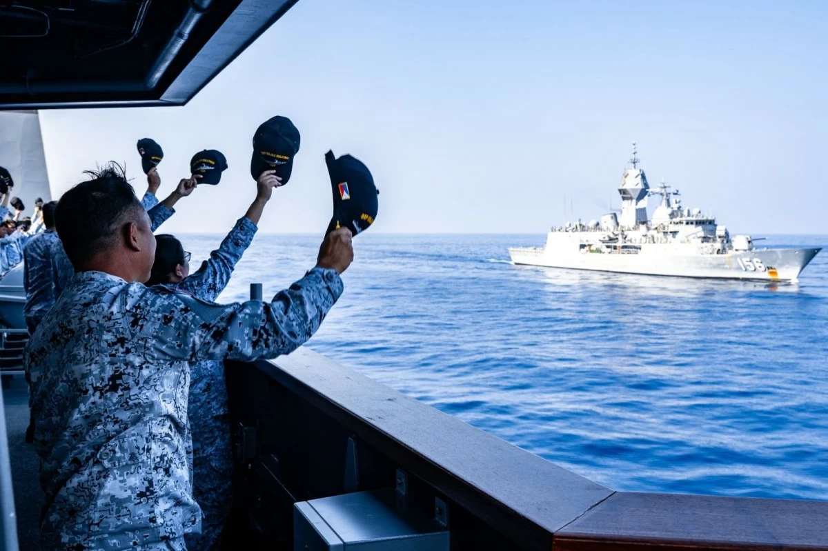 Philippine Navy personnel aboard BRP Rajah Sulayman (PS20) render honors alongside their Australian counterparts during a passage exercise, demonstrating professionalism and mutual respect among partner forces, as part of the Multilateral Maritime Cooperative Activity (MMCA). (Photo: Armed Forces of the Philippines)