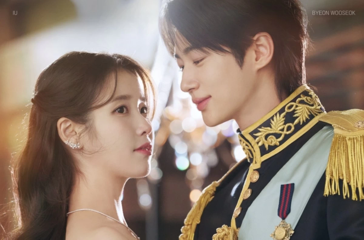 IU and Byeon Woo-seok in a poster for "Perfect Crown" (Disney )