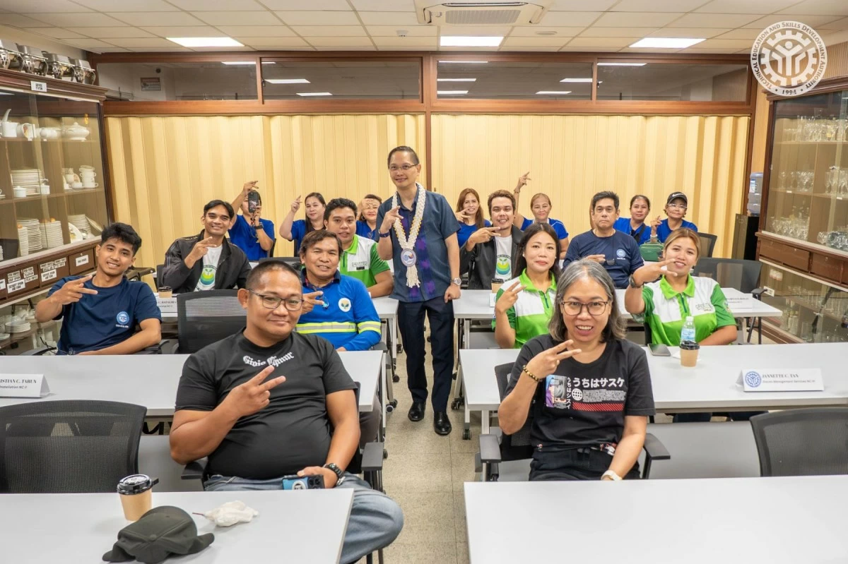 Technical Education and Skills Development Authority (TESDA) Director-General Jose Francisco “Kiko” B. Benitez (left) engages with trainees of technical-vocation education and training (TVET) at the TESDA regional training center in Central Luzon. (Photo: TESDA)