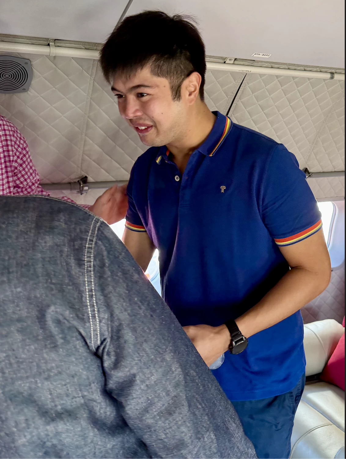 Vinny Marcos meets with members of the media delegation before departure.