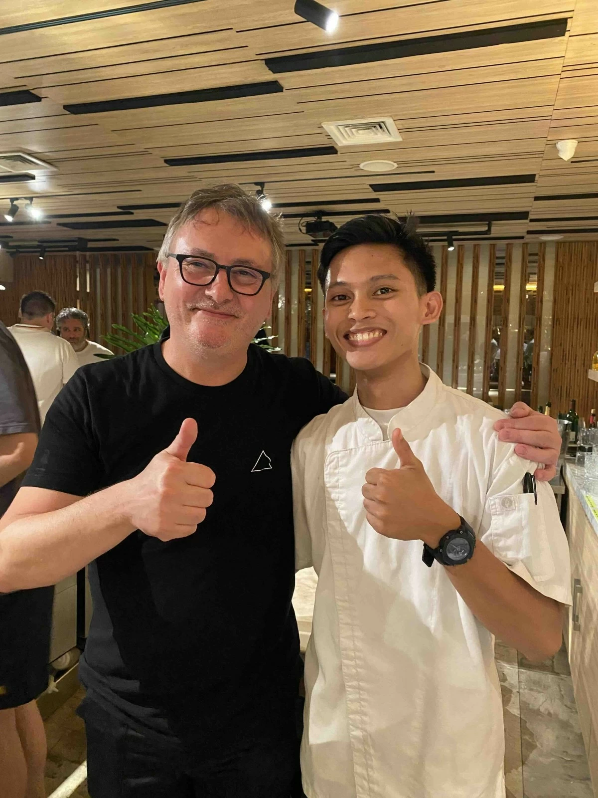 Rhey John A. Villamor worked as an intern at Gallery by Chele. With him is Spanish chef Andoni Luis Aduriz, one of the restaurant's esteemed guest chef collaborators.