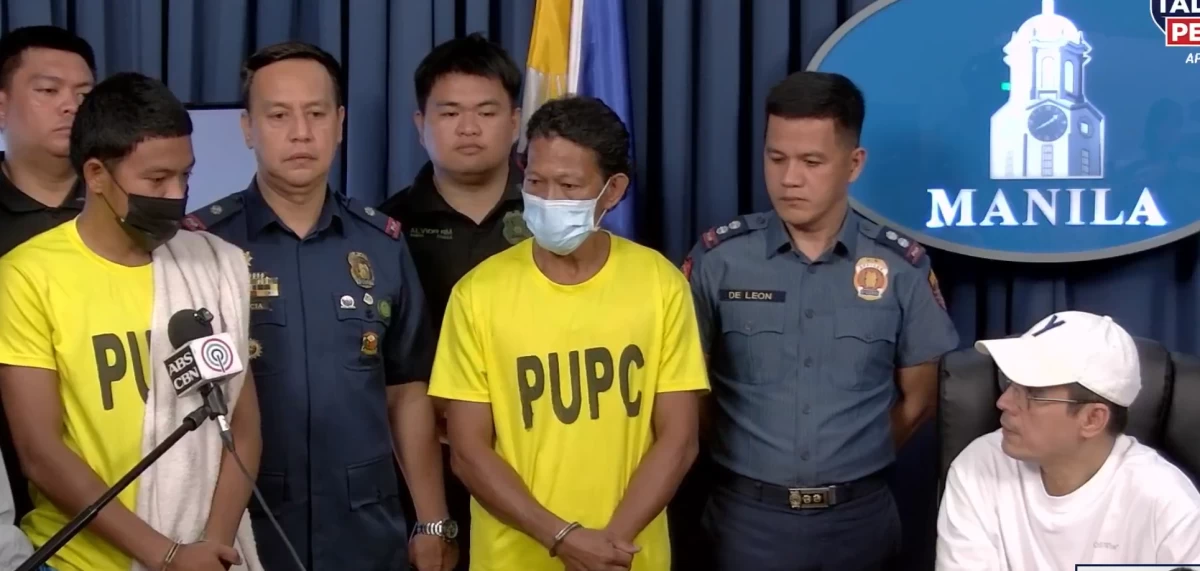 Manila Mayor Francisco “Isko Moreno” Domagoso presents the father-and-son suspects at the Manila City Hall following their surrender to the Manila Police District on April 15 in connection with the fatal computer shop killing in Tondo. (Manila PIO)