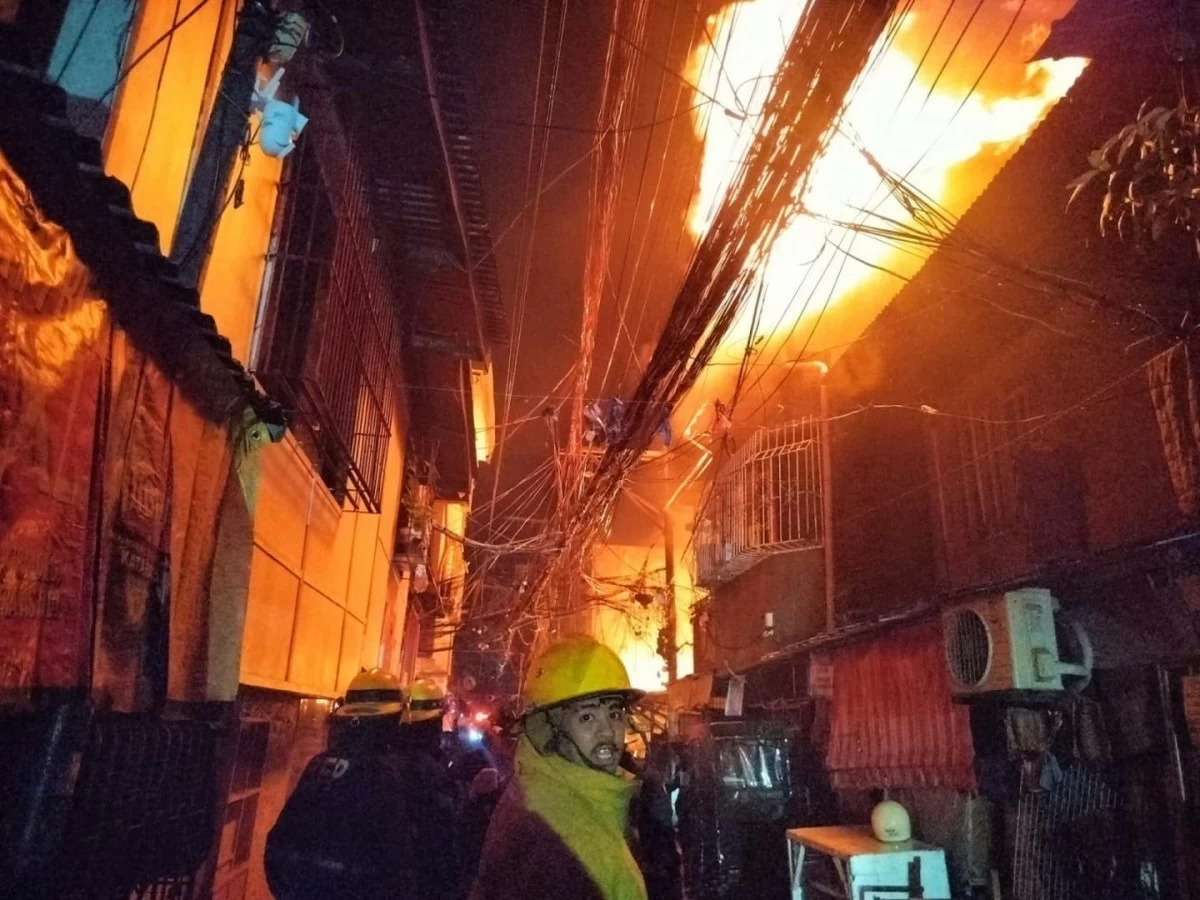 Firefighters battle a 3rd alarm blaze in Barangay 121, Tondo, Manila, working to contain the fire before it was extinguished ahead of 9 p.m. (Photos courtesy: Manila PIO)