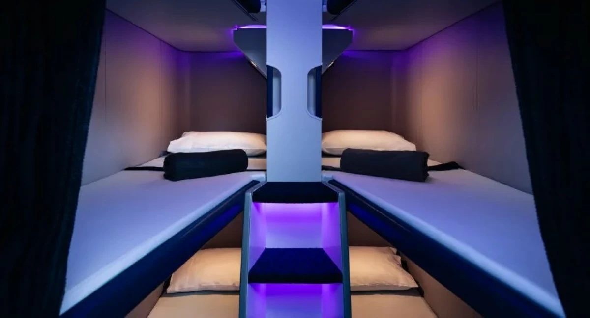 COMFORT IS KING Skynest users are treated to a bunk-bed style space, complete with a pillow, blanket, and amenity kit. (Photo courtesy of Air New Zealand)