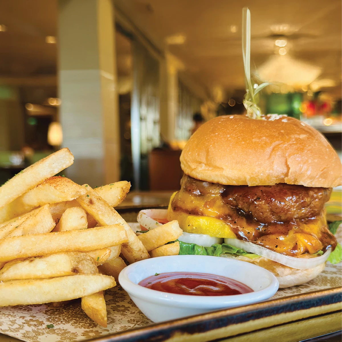 Indulge in the Ultimate Pork Burger at the Lobby Lounge (Photo courtesy of The Manila Hotel)