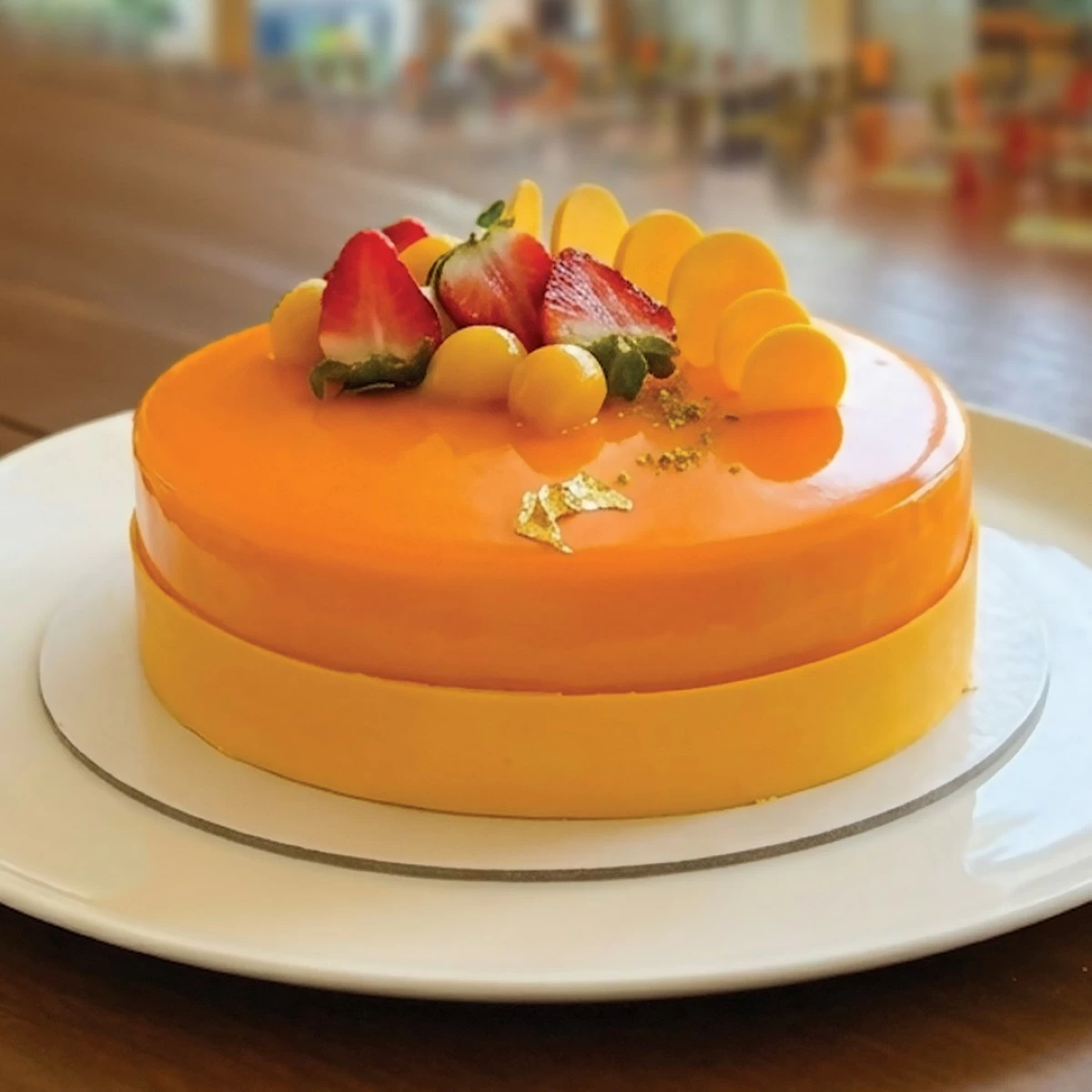 Over at the Delicatessen, the Tropical Harmony Cake captures the essence of summer every bite—light, luscious, and indulgently golden (Photo courtesy of The Manila Hotel)