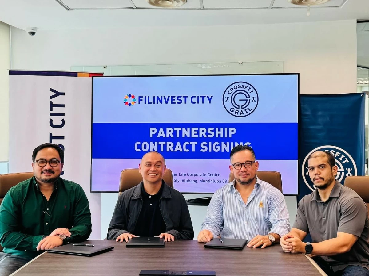 Don Ubaldo, Head of Filinvest Townships, joins CrossFit Grail partners Francis Reyes, Clarence Pimentel, and Paddy Paulin during the contract signing for the upcoming Filinvest City Sports Hub.

