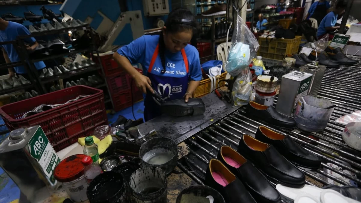 A shoe factory employee at work. A recent report highlights that 33 percent of firms lack the specialized talent needed to maintain Physical AI systems—creating a massive demand for workers who can bridge the gap between manual expertise and digital intelligence.