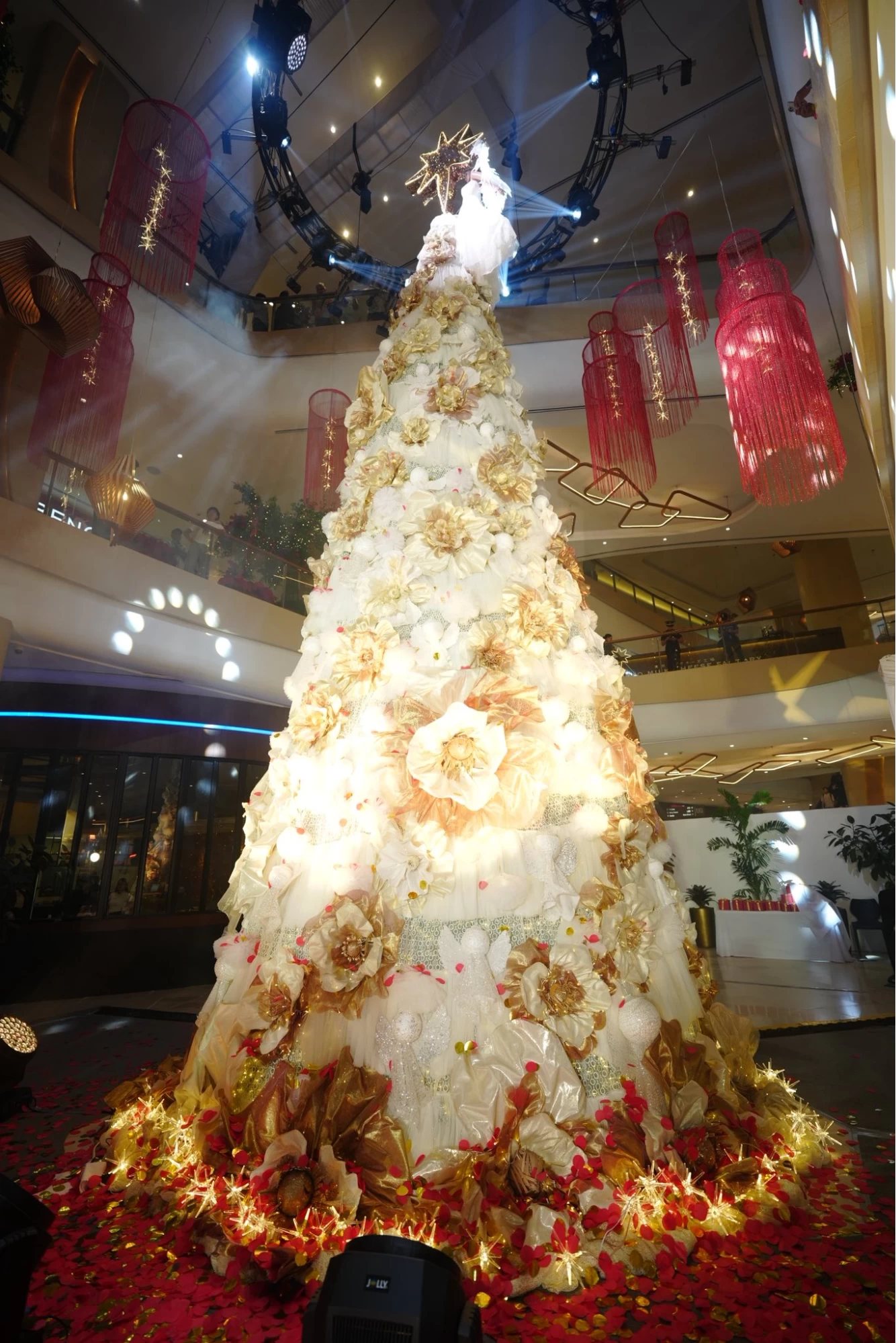 The collaboration between Michael Leyva and Uptown Bonifacio transformed couture waste into a large-scale holiday installation.