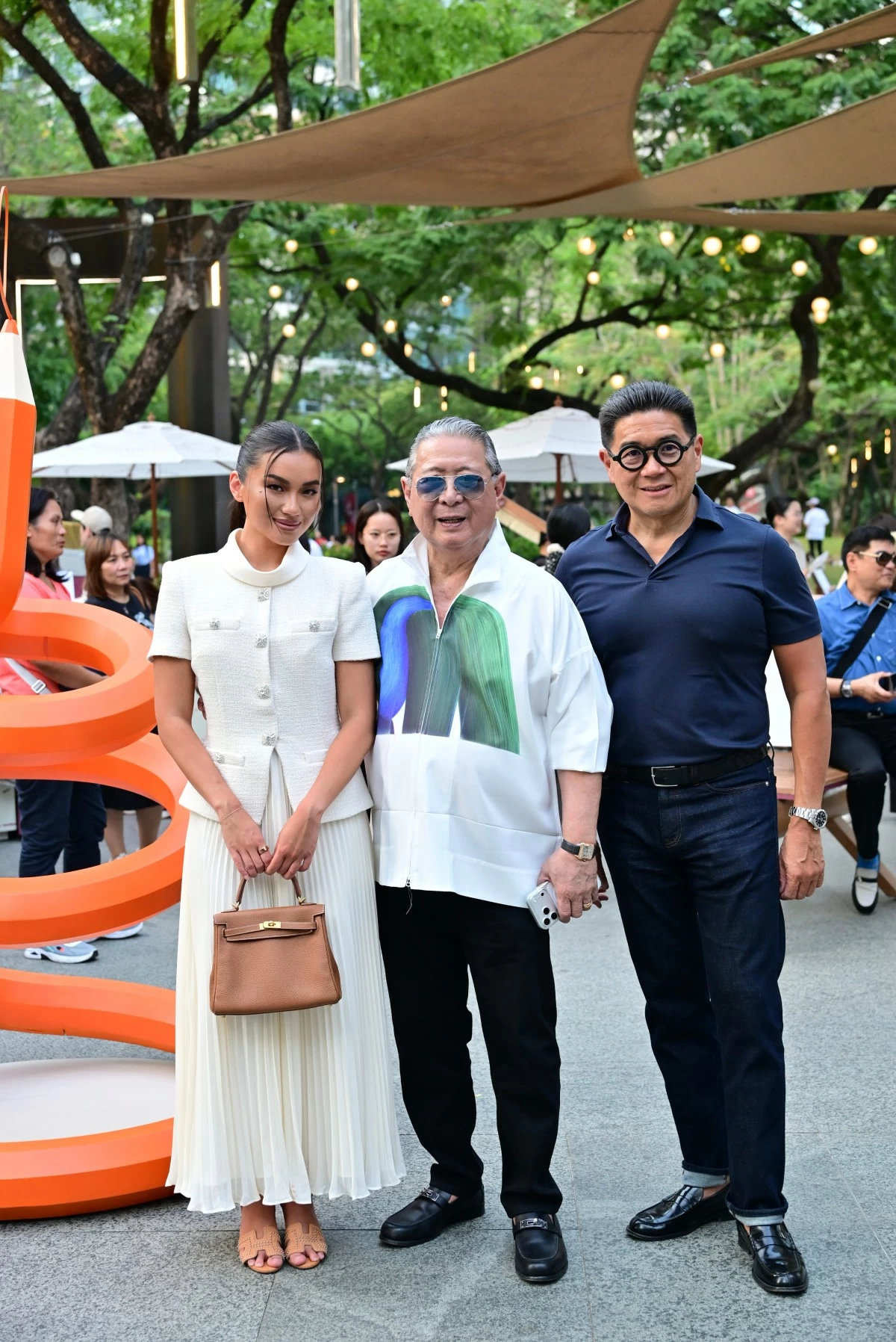 SSI Group Inc. business development director Nikki Huang, senior vice president Mario Katigbak, and president and CEO Anthony Huang (Photo: Hermès)