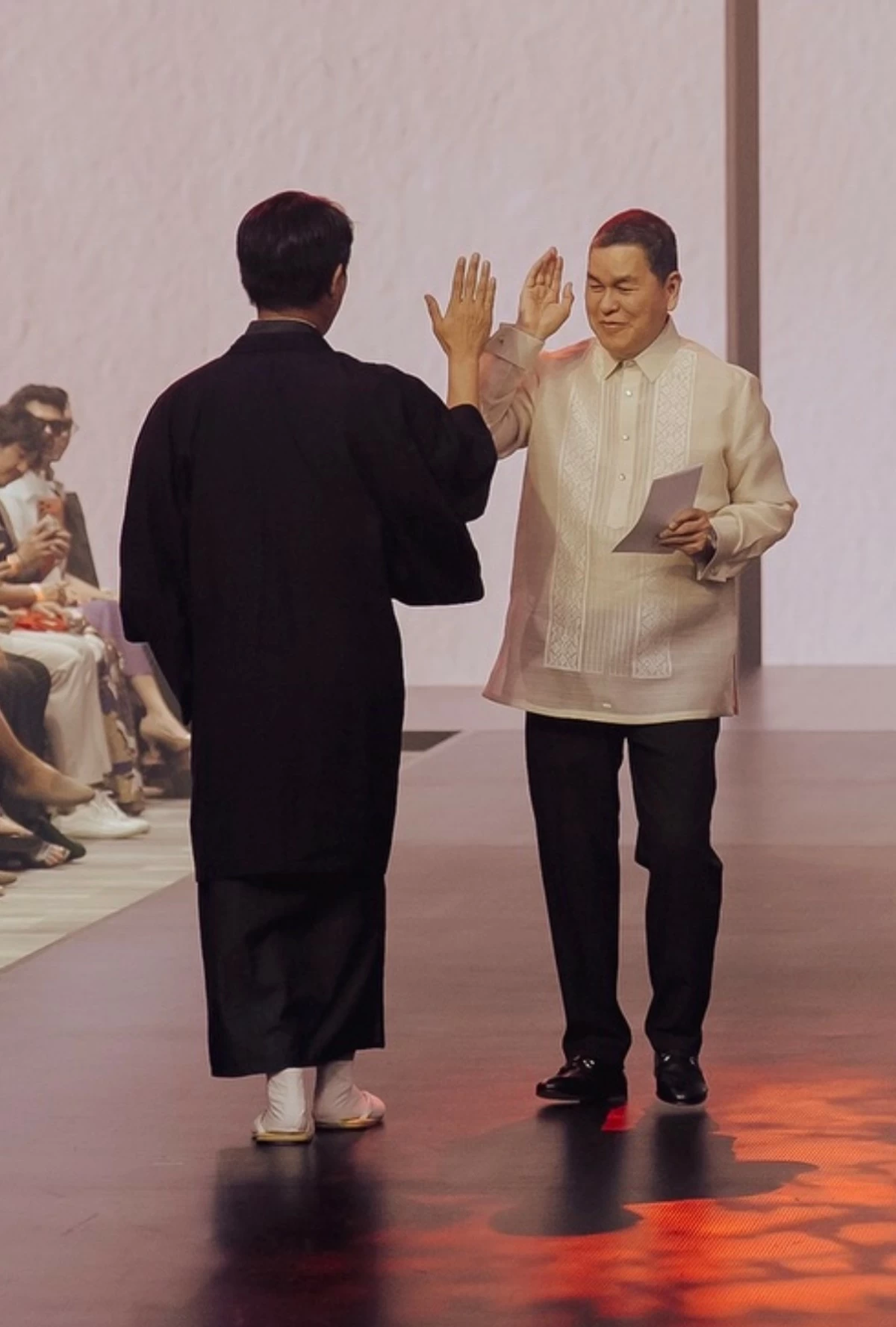 Japan's Ambassador to the Philippines, Kazuya Endo, share a high-five with Filipino businessman Ben Chan..jpg