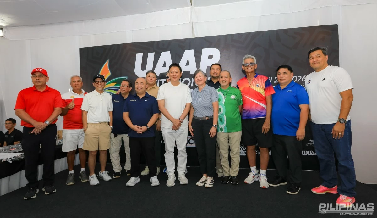 UAAP Season 88 president Rev. Fr. Rodel Cansancio, O.P., of UST (center) and Pilipinas Golf Tournaments, Inc. general manager Colo Ventosa (right) seal their three-year partnership with a handshake during the UAAP–PGTI Invitational golf tournament at The Country Club on Monday. With them is UAAP Season 88 Executive Director Rebo Saguisag.