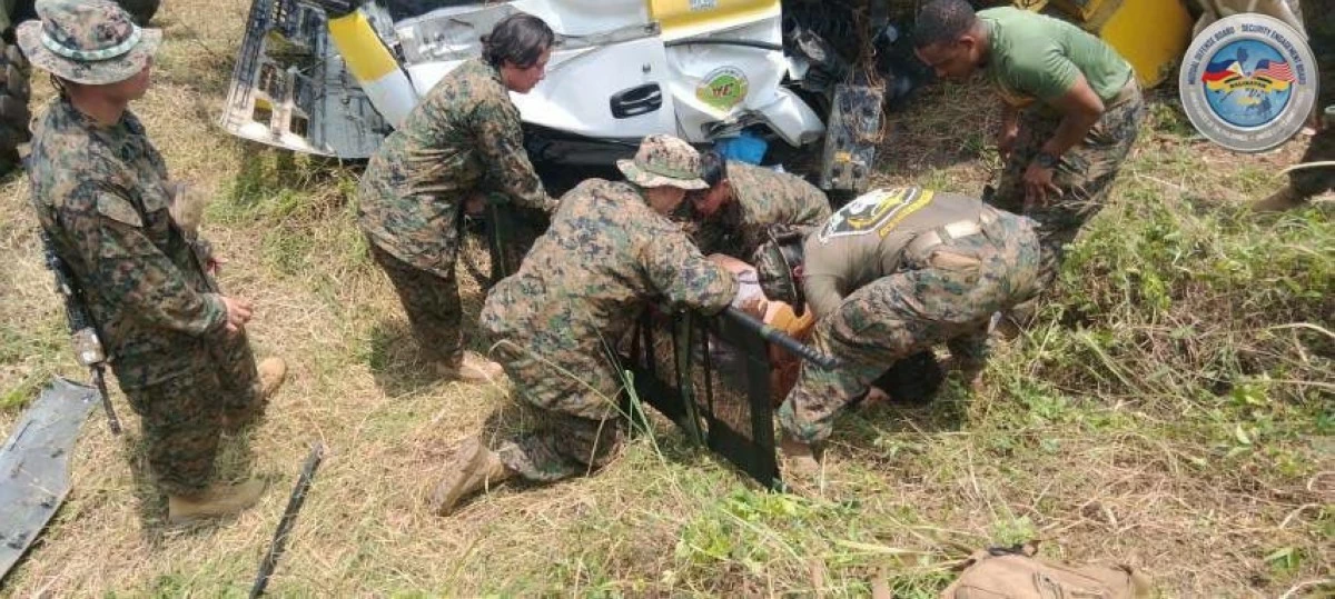 U.S. Marine Corps (USMC) personnel conduct initial rescue operations, extracting victims from a crashed vehicle during a vehicular accident on April 20, 2026 near Lal-lo Airport in Cagayan. (Photo: Armed Forces of the Philippines)