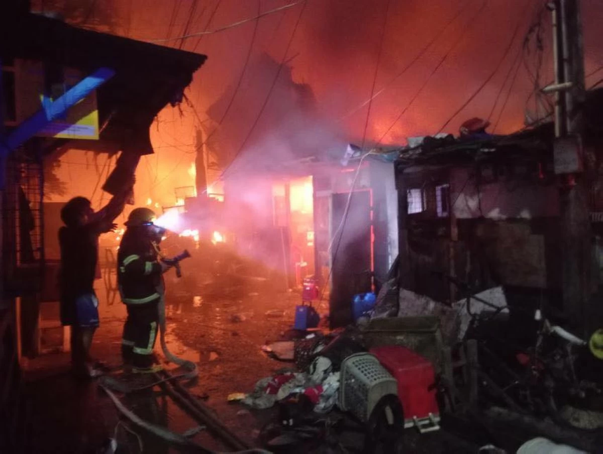 Around 80 families lost their homes in a fire in Barangay Niog, Bacoor City, early morning on April 22 (Photo from the City Government of Bacoor/MANILA BULLETIN)