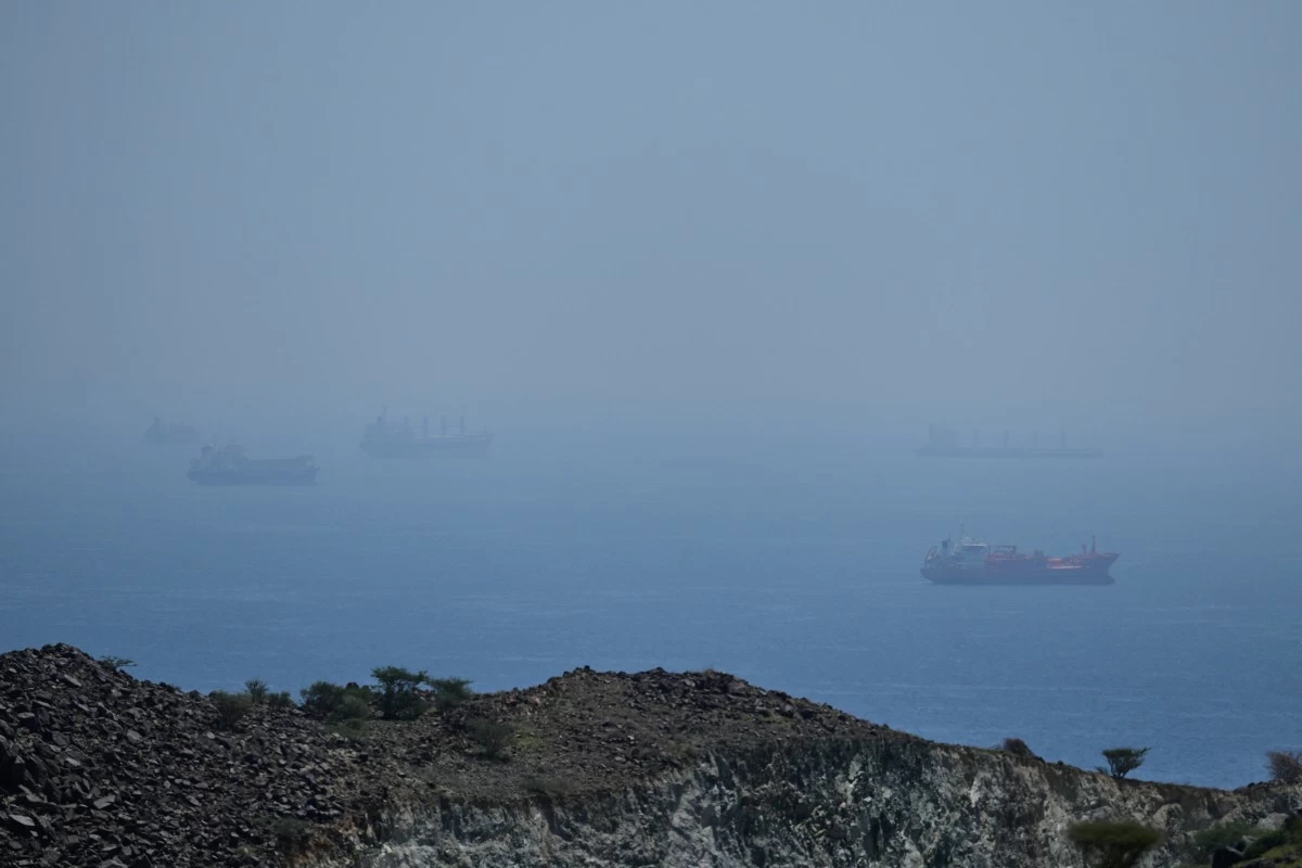 Tankers and bulk carriers anchored in the Strait of Hormuz, Saturday, April 18, 2026. (AP Photo)