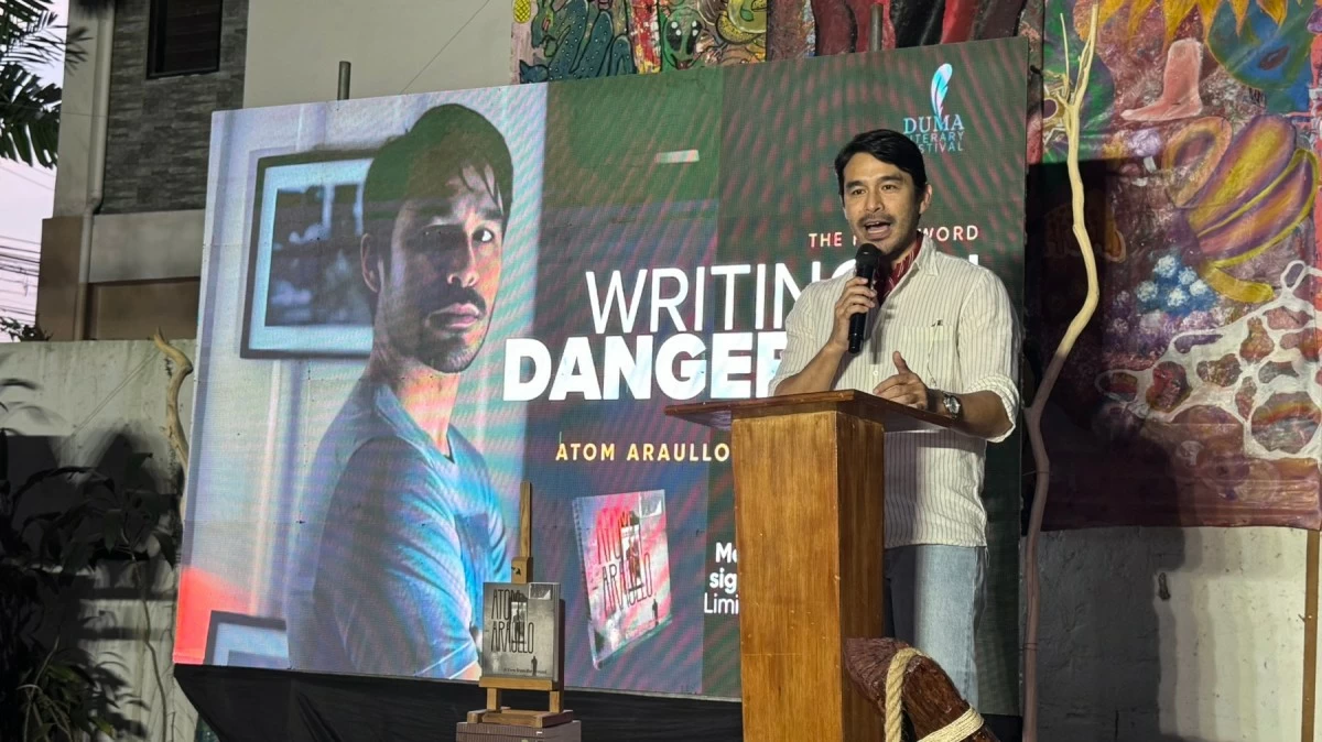 JOURNALISTIC PERSPECTIVE - Atom Araullo gives the keynote talk, on 'Writing in Dangerous Times,' for the last day of the Duma LitFest.