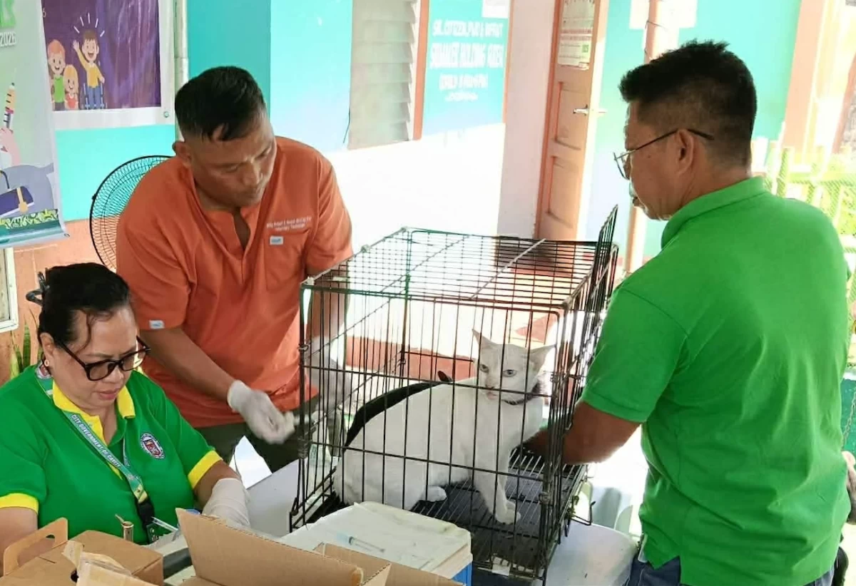 The Cavite City Veterinary Office holds a free anti-rabies vaccination drive (Photo from the City Government of Cavite/MANILA BULLETIN)