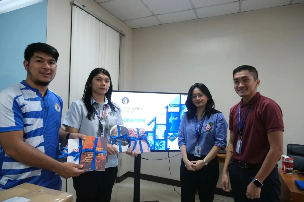 Representatives from Ateneo de Manila University turn over donated books and academic journals to the Manila City Library officials to expand public access to research and literary works. (Photo from Manila City Library)