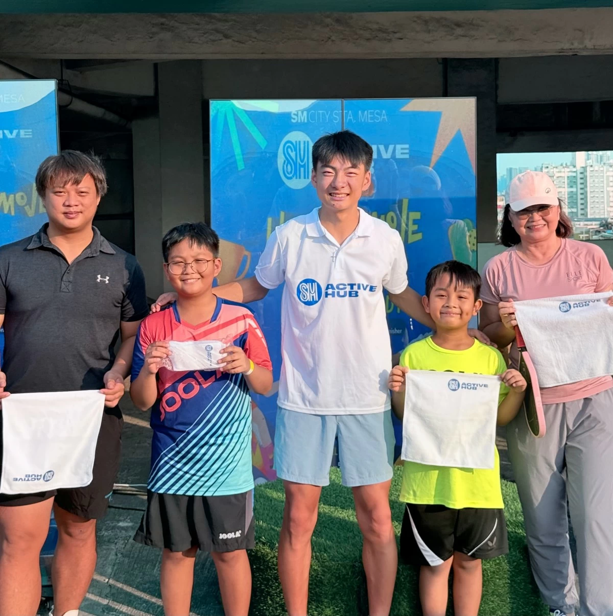 All smiles as Canadian National Champion and PPA Tour athlete Mackonner Dy joins Pickleball for Kids at the pickleball court of SM City Sta. Mesa during the SM Active Hub Anniversary.
