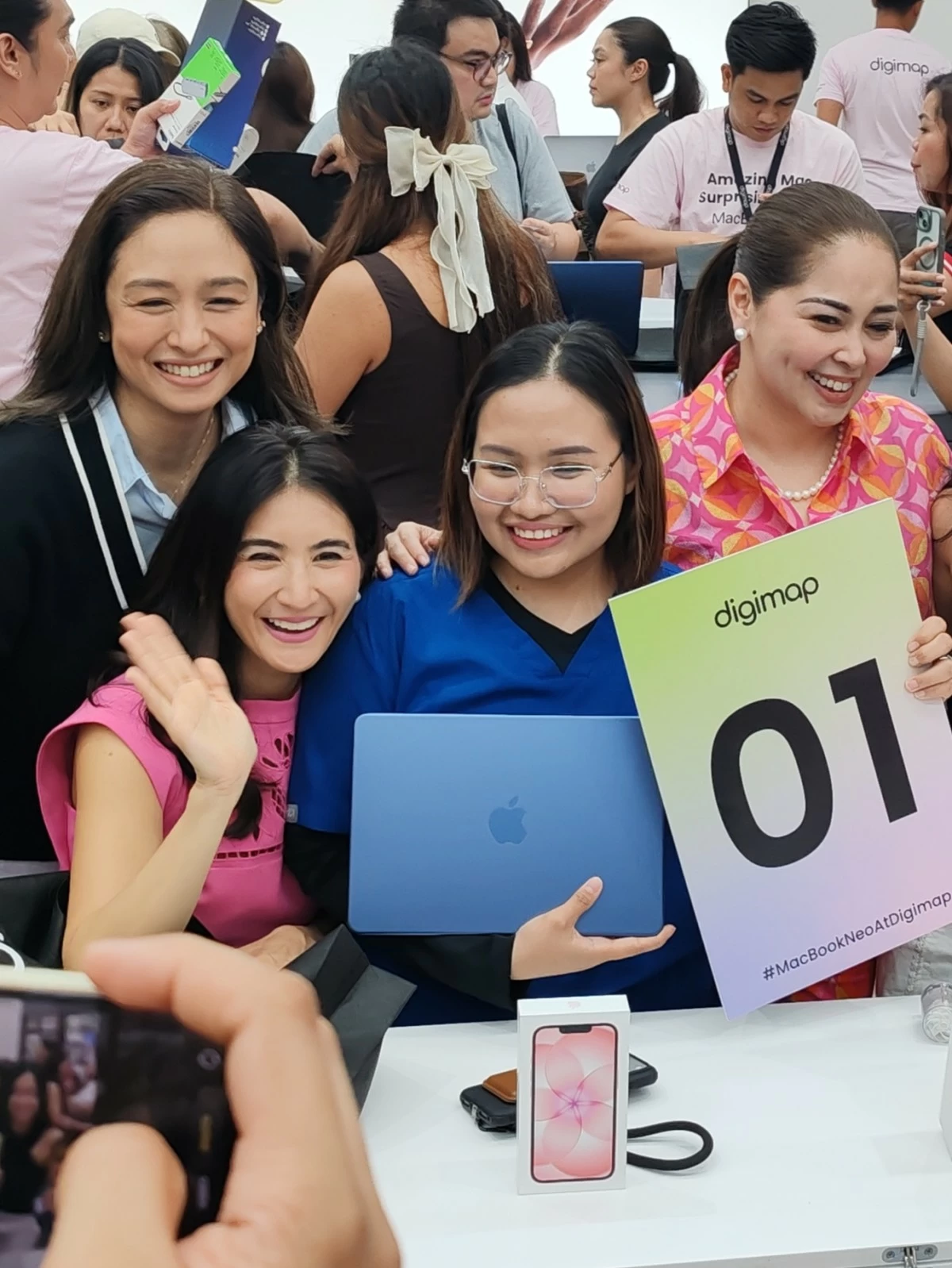Lyka Ricafranca of Laguna is the first lucky buyer of a MacBook Neo at Digimap One Ayala.
