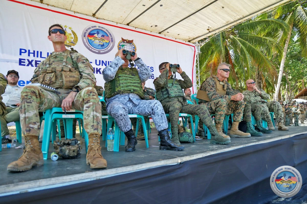 (L-R) Major General James Bartholomees, commander of the 25th Infantry Division, US Army; Vice Admiral Alan M. Javier, commander of Western Command; General Romeo S Brawner Jr, Armed Forces of the Philippines (AFP) Chief of Staff; Major General Thomas Savage, commander of the U.S. JTF for Exercise Balikatan 2026; and Rear Admiral Brent DeVore, commander of the Expeditionary Strike Group 3; monitor the impact of synchronized air and land strikes during the Counter-Landing Live Fire Exercise (CLLFX-West) held on April 27, 2026 at Apurawan Beach Landing Site in Aborlan, Palawan as part of Exercise Balikatan. (Photo by SSg Ambay PA/PAOAFP)