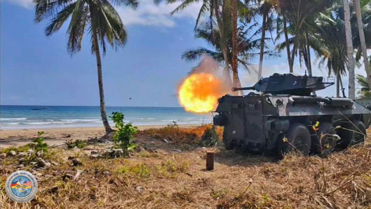 A light armored vehicle (LAV) deployed by the Philippine Marine Corps’ 3rd Marine Brigade engages simulated maritime threats during the Counter-Landing Live Fire Exercise - West in Apurawan Beach, Aborlan, Palawan on April 27, 2026 as part of Exercise Balikatan. (Photo by 3rd Marine Brigade, Philippine Marine Corps)