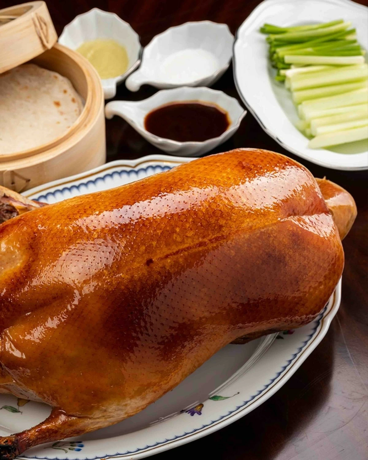 DUCK ICON House Peking duck, crisp-skinned and deeply flavorful, remains a centerpiece of the restaurant’s Cantonese repertoire (Photo: Grand Hyatt Manila)