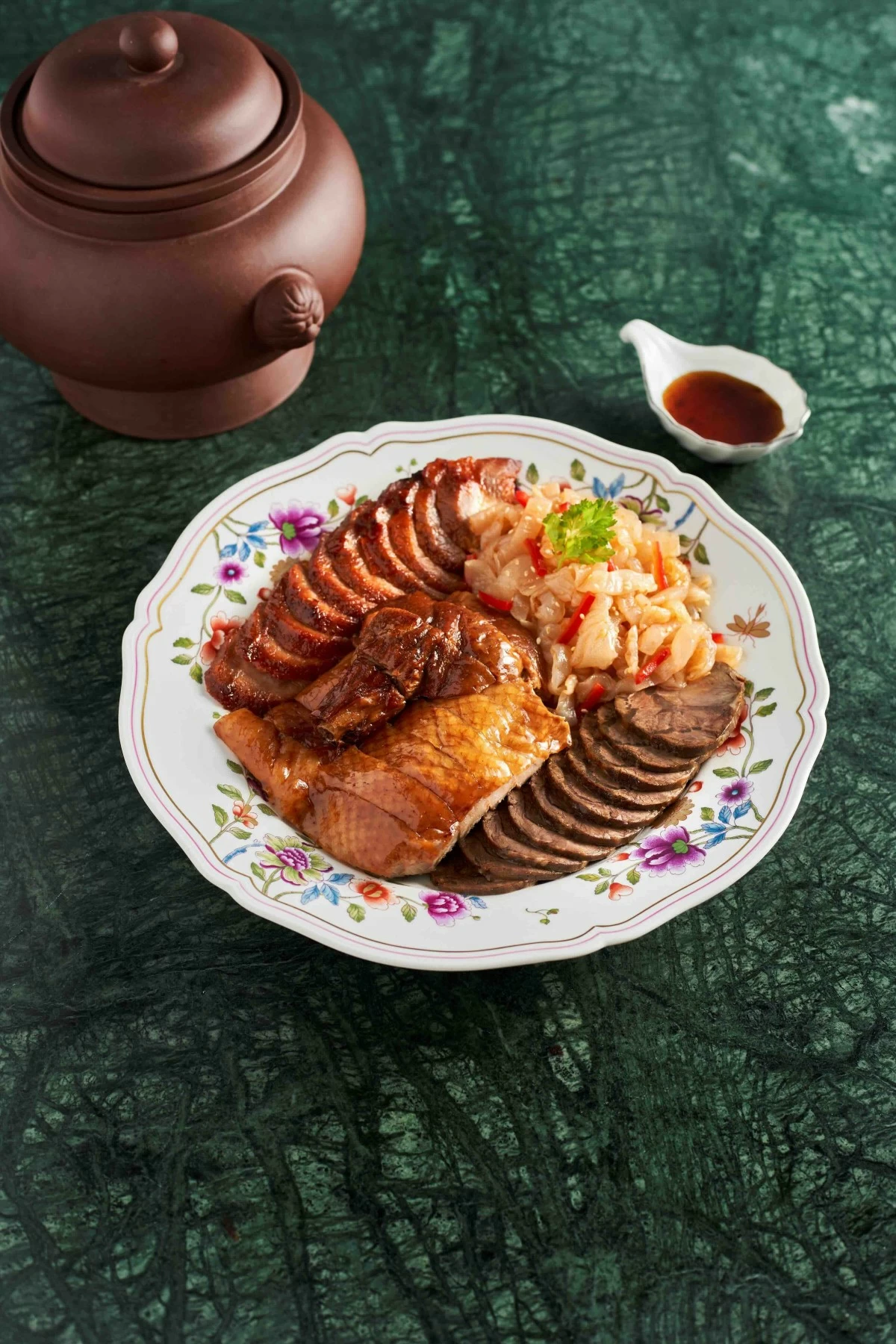 BARBECUE PLATE Cantonese barbecued combination of roasted duck, barbecued pork, jellyfish and air-dried beef showcases a range of textures and traditional flavors (Photo: Grand Hyatt Manila)