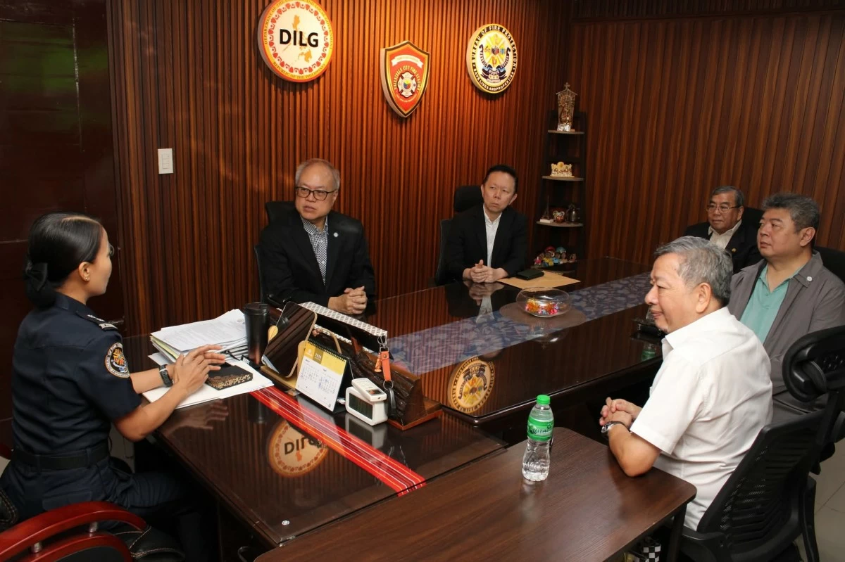 CFBCI representatives meet with Valenzuela Fire Marshal FSupt. Ma. Theresa Alqueza to discuss fire safety compliance and prevention efforts. (Photo courtesy of CFBCI)