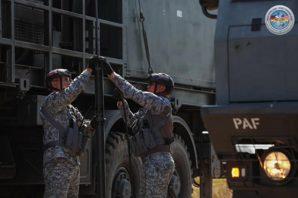 Philippine Air Force personnel conduct a security check prior to the activity as the PAF SPYDER Air Defense System takes part in the Integrated Air and Missile Defense (IAMD) drill under Exercise Balikatan on April 28, 2026 at Naval Station Leovigildo Gantioqui (NSLG) in San Antonio, Zambales. (Photo: Armed Forces of the Philippines)