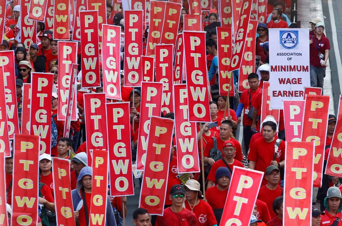 Thousands of workers and activists march along España Boulevard in Manila on May 1, 2026, as Labor Day protests call for higher wages and lower prices of basic goods. (Photo taken by Mark Balmores/MANILA BULLETIN)