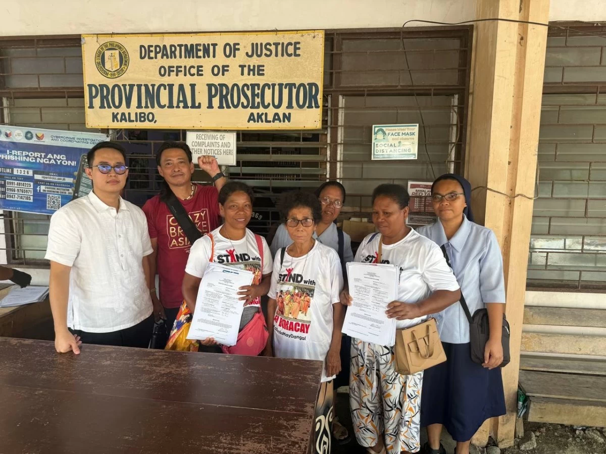 NATIVE Ati people from Boracay Island with former Ifugao Rep. Teddy Baguilat Jr. after filing cases against a private land developer for evicting them.  (Boracay Ati) 
