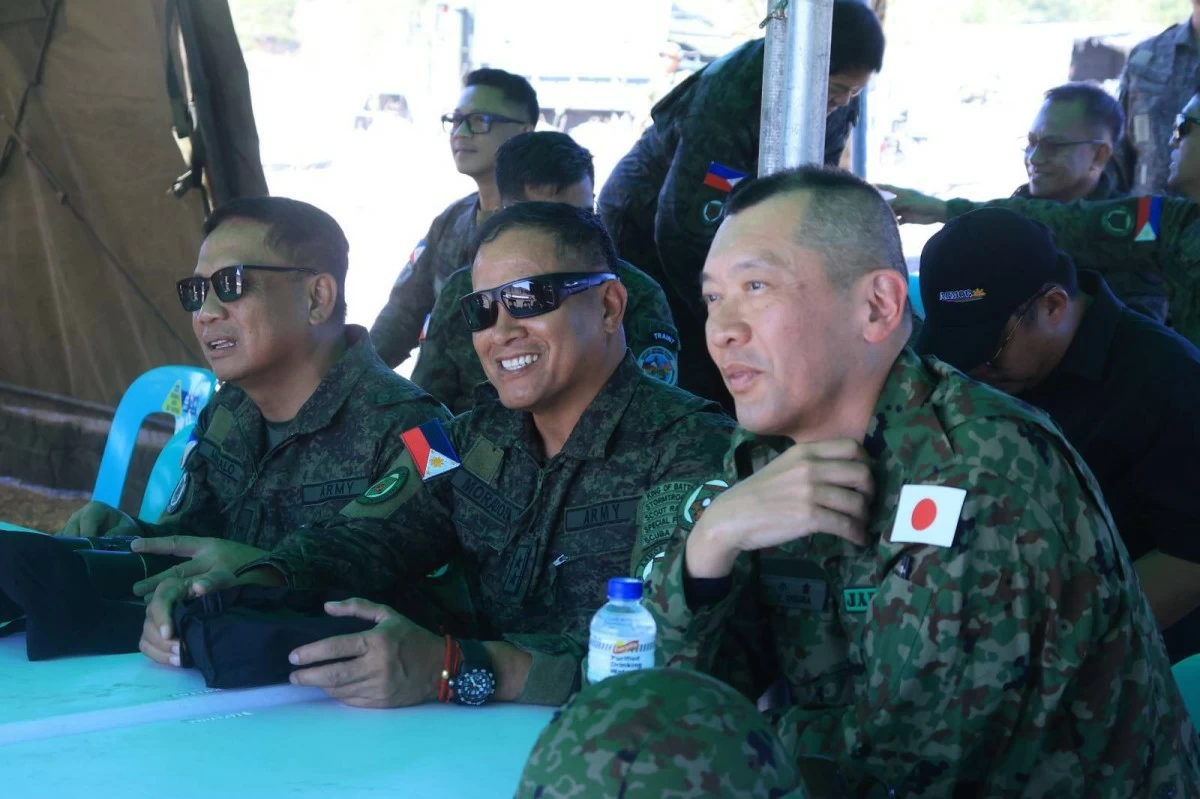 (L-R) Armor Division Commander Brig. Gen. Ronel R. Manalo, Philippine Army (PA) Vice Commander Maj. Gen. Efren F. Morados, and Japan Ground Self-Defense Force 12th Brigade Deputy Brigade Commander Col. Yoshifumi Ogura witness the first-ever combined live fire exercise of the two forces as part of Exercise Salaknib at Colonel Ernesto Rabina Air Base (CERAB) in Capas, Tarlac held from May 1 to 2, 2026. (Photo: PA)