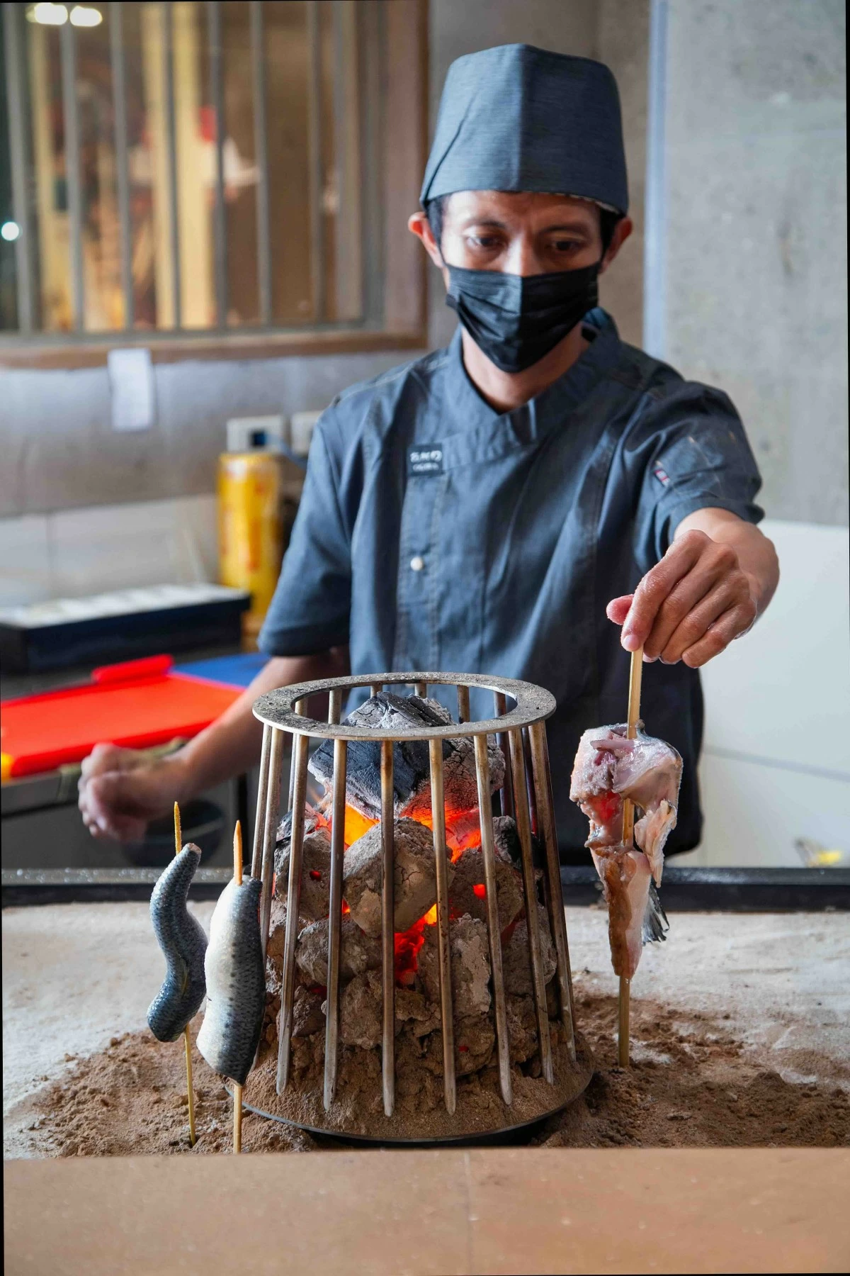 A key highlight of the new OGAWA is its live robatayaki grilling experience, where guests can witness dishes being expertly prepared over open charcoal flames (Photo: Ogawa)