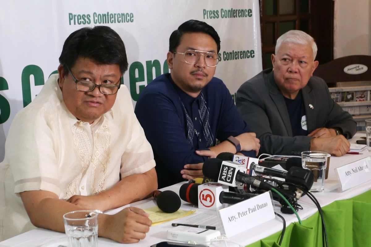 Lawyers Peter Paul Danao (left) and Neil Abayon (middle), members of the legal team of Atty. Manases “Mans” Carpio—husband of Vice President Sara Duterte—face the media during a press conference in Quezon City on May 4, 2026, denying the alleged P6.7-billion AMLC transactions as “fake” and raising concerns over privacy and the misuse of bank data. (Santi San Juan / Manila Bulletin)