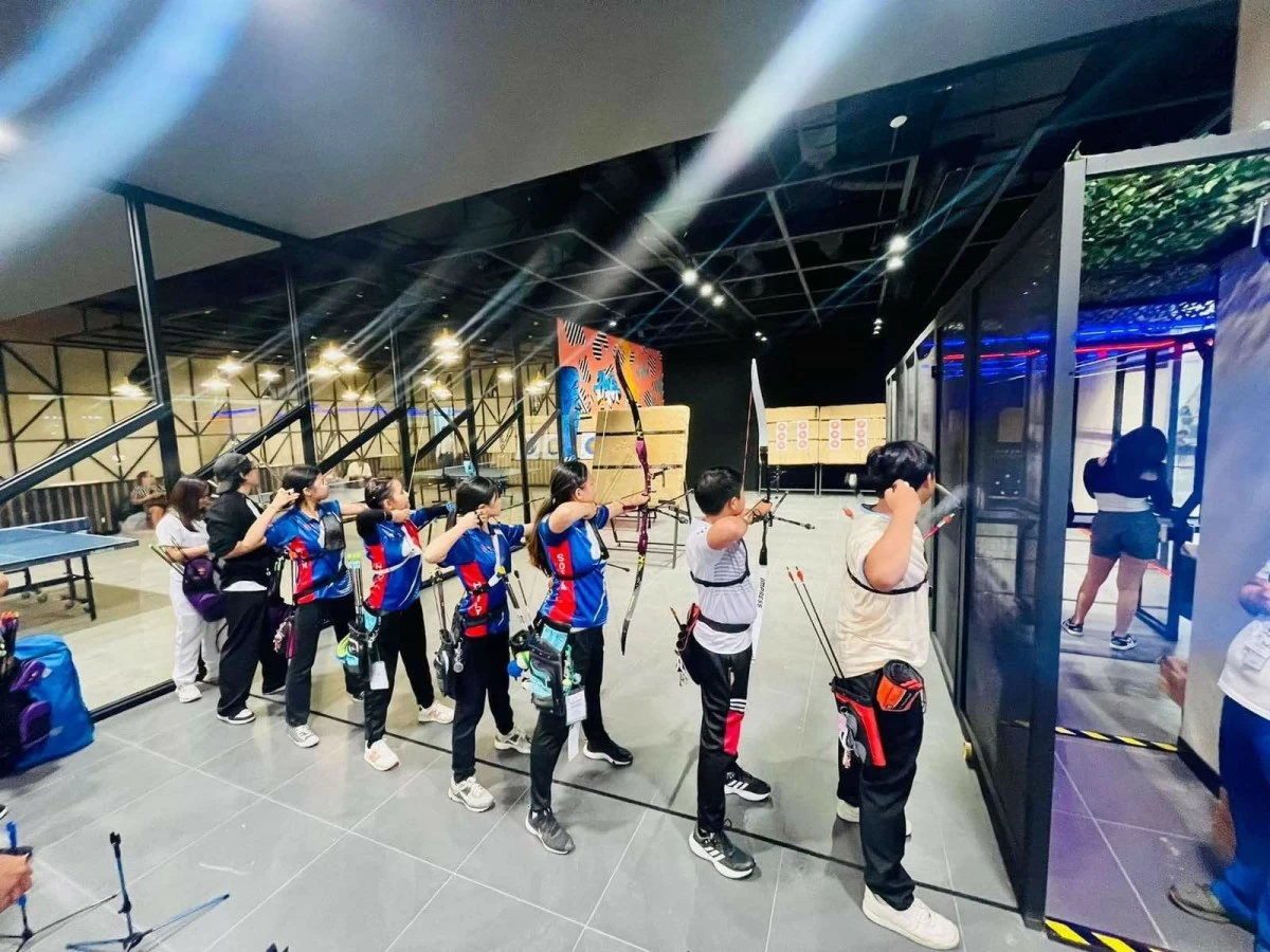 Participants take aim at the archery clinic at SM, developing focus, control, and precision in a fun, maxed-out experience this summer.
