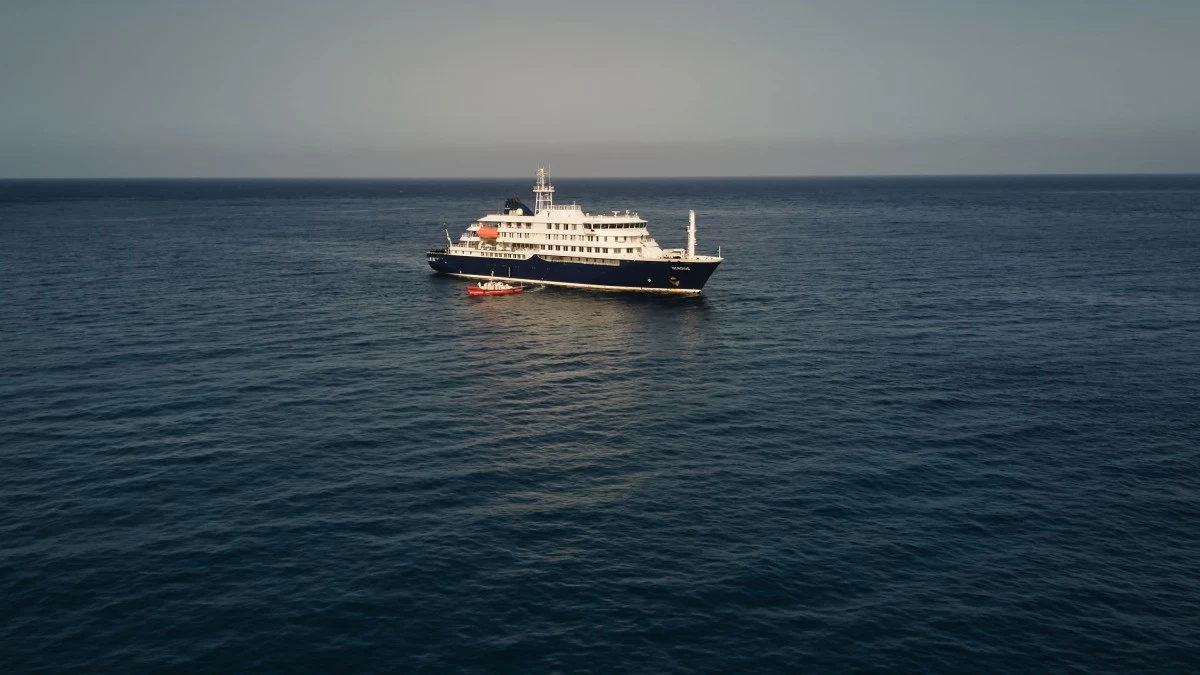 An aerial view of the MV Hondius Dutch cruise ship anchored in the Atlantic off Cape Verde, Tuesday, May 5, 2026. (AP Photo/Arilson Almeida)