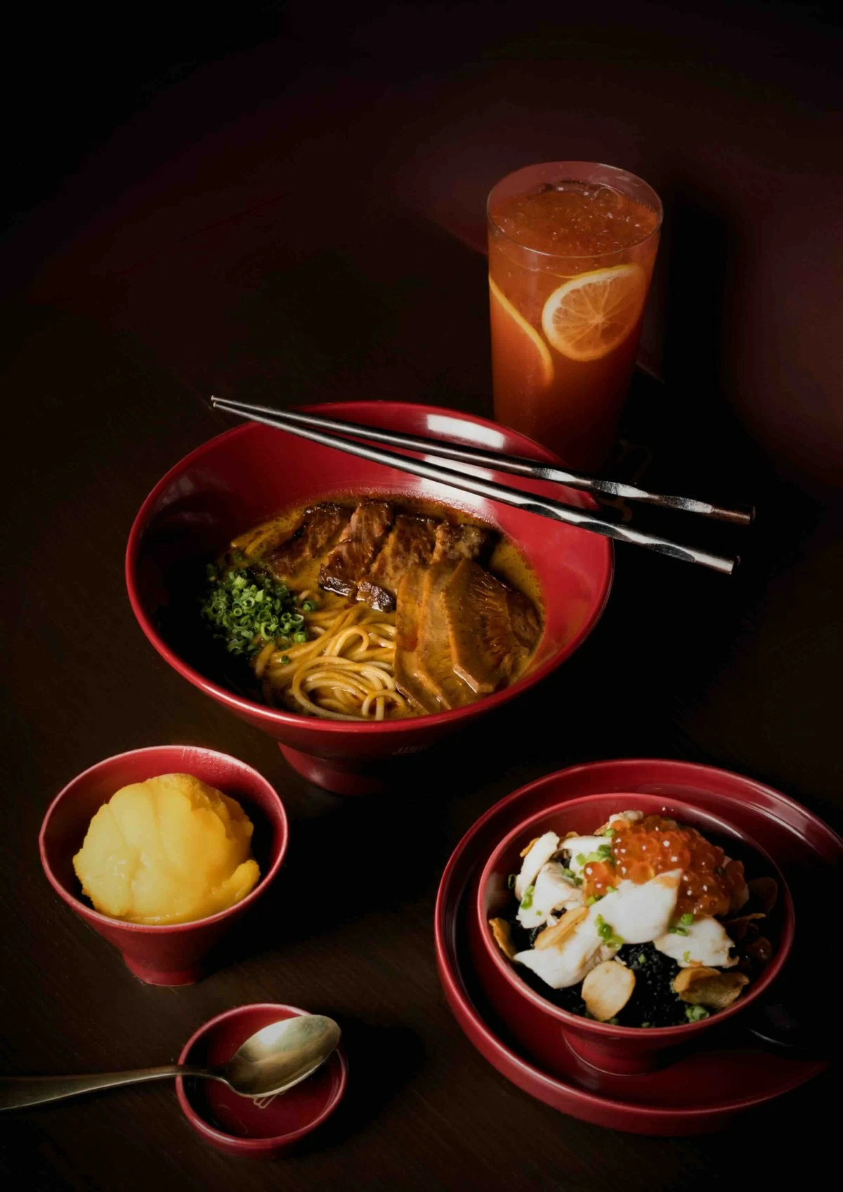 CHAOTIC BITES The four collaboration dishes of chefs Jorge Mendez and Raul Forés include the Gyu-kai Batwan Ramen, Kuro Chahan with Crab and Ikura, Mango Sorbet with Chocolate Mochi, and 'The Raul Mendez' drink, available at Mugen Ramenya until May 31. (Photo: Mugen Ramenya)