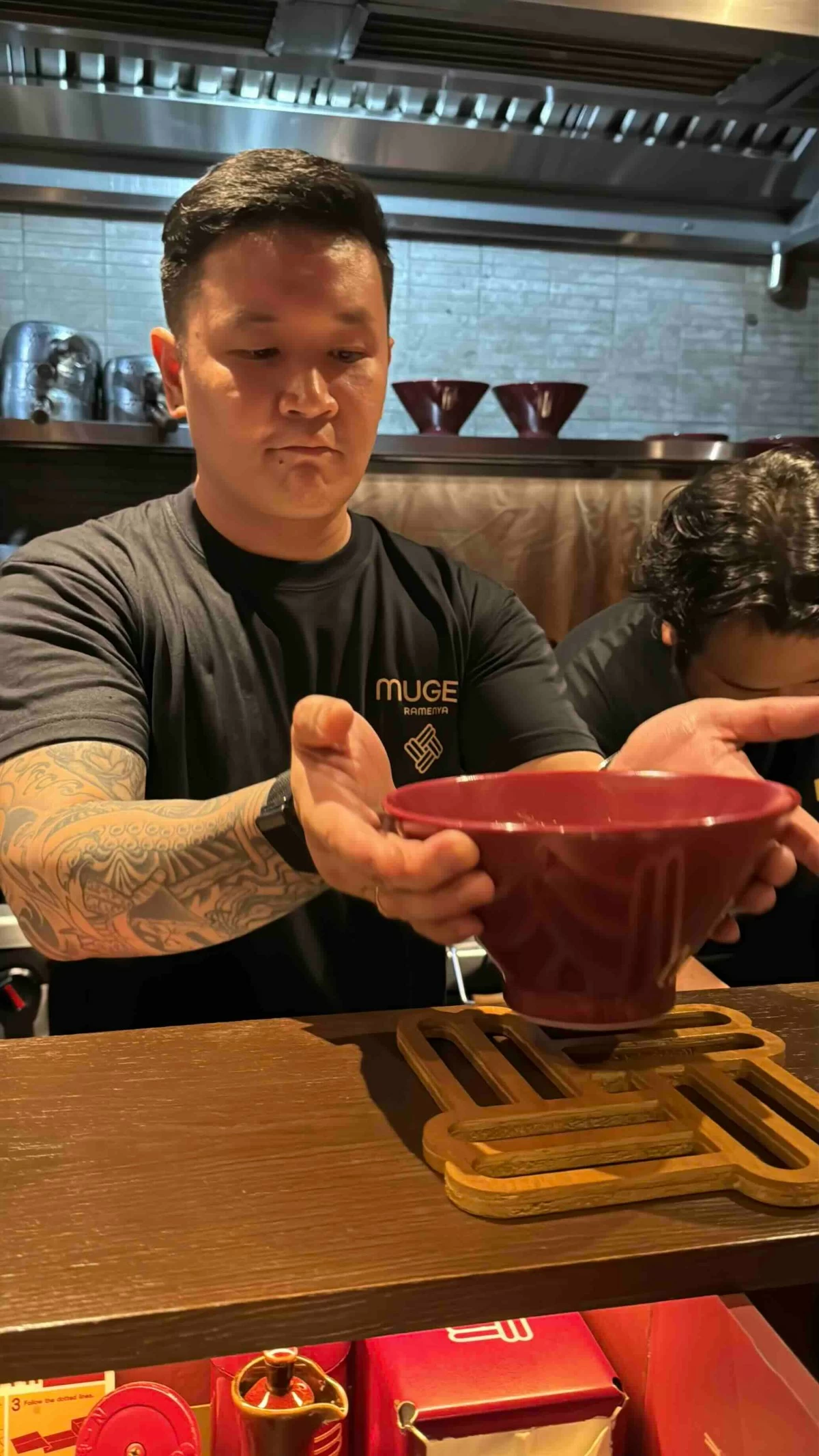 COUNTER SERVICE Chef Jorge Mendez serves ramen across the counter at Mugen Ramenya (Photo: Feliciano Rodriguez III/Manila Bulletin)