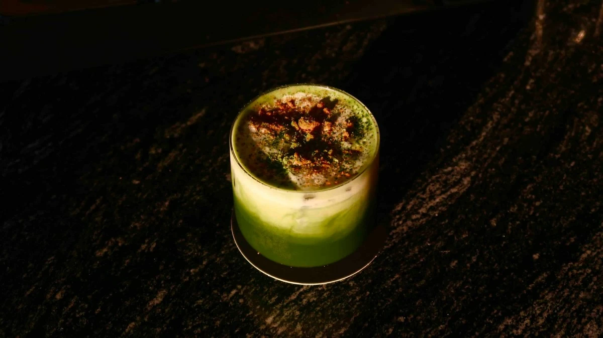 MATCHA CHAOS SERVED Nightmare in Kyoto combines tequila, espresso, matcha, carrot cake spices, and oolong tea in one of the more unconventional cocktails on the “Roots” menu. (Photo: Three Dots)