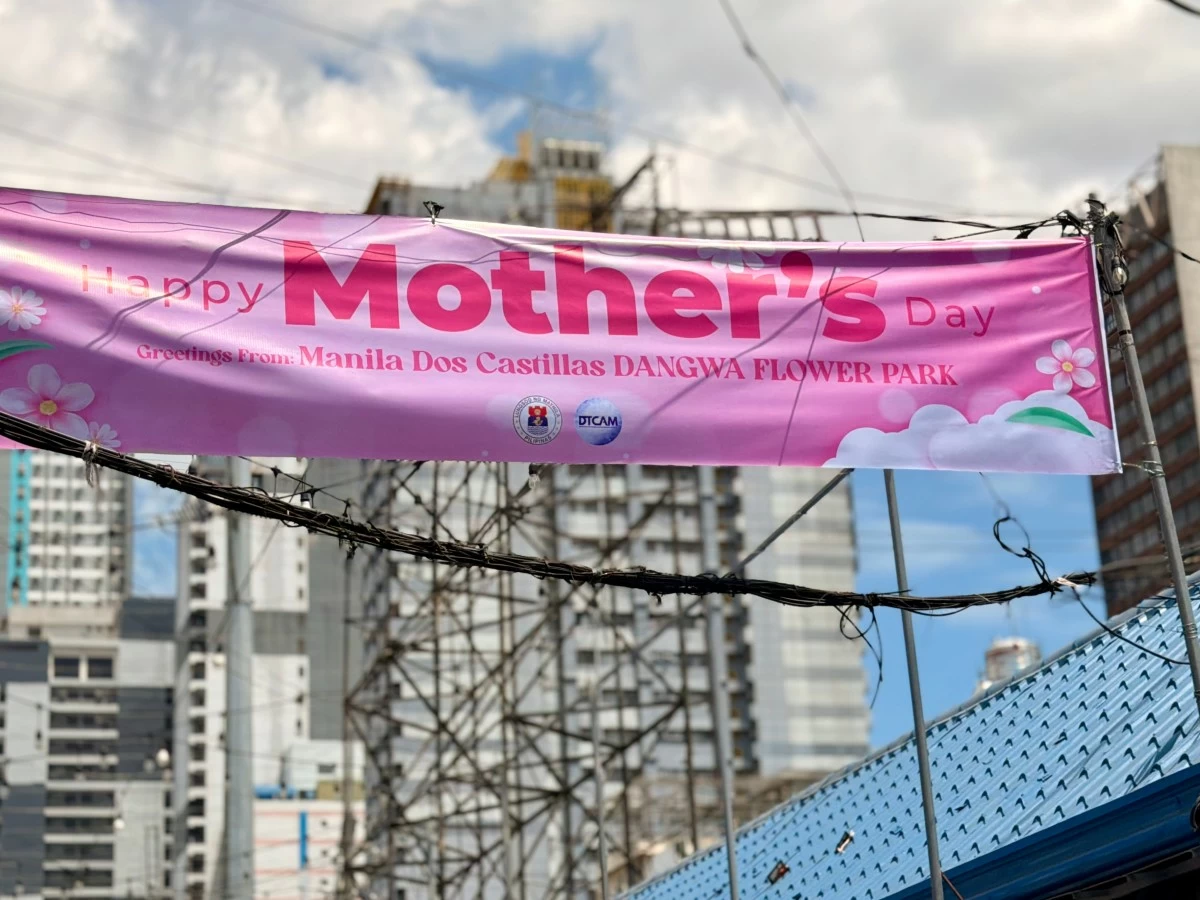 Banner of the Dangwa Flower Park recently launched by the local government along Dos Castillas Street as part of efforts to organize flower vending areas ahead of peak seasons like Mother’s Day.