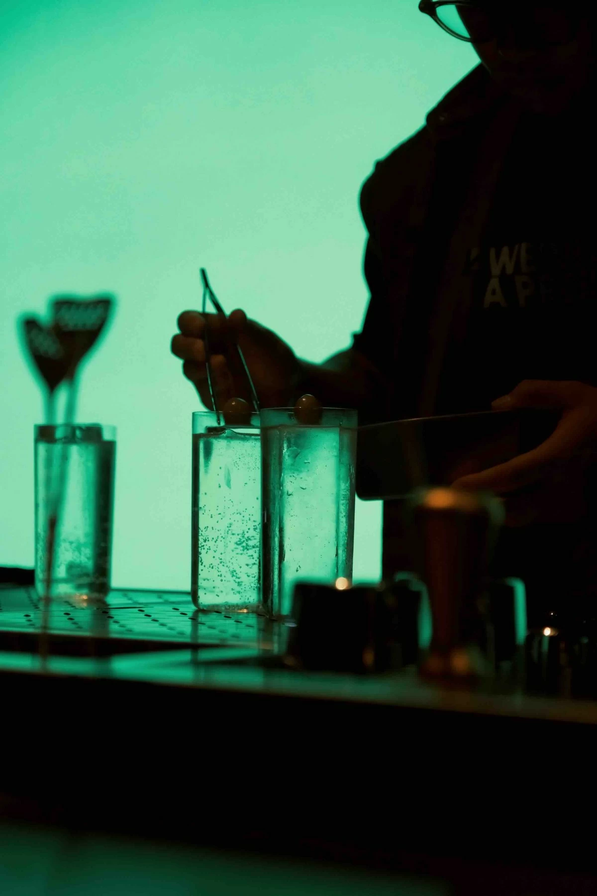 GREEN FEVER GLOW The interiors of Problem Child are transformed with eerie absinthe-green lights and immersive visuals during its collaboration (Photo: Keso)
