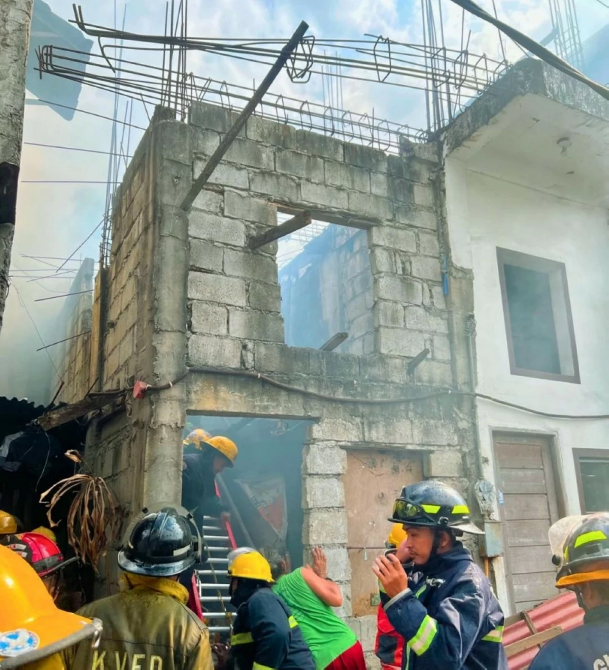 Firefighters respond to a fire in Barangay Ususan, Taguig on May 9 (Photo from P.P. Northside Fire & Rescue/Facebook)