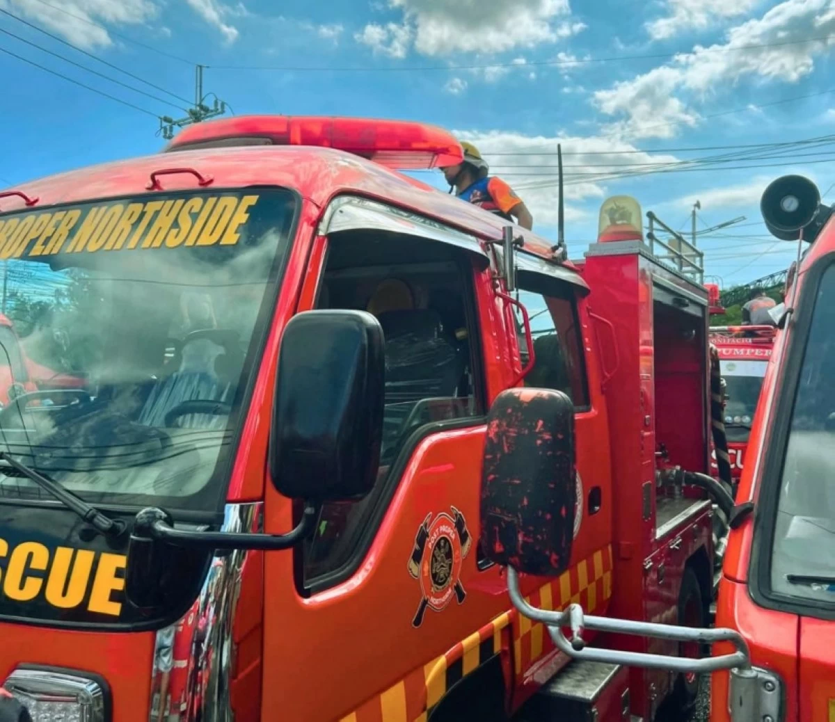 Firefighters respond to a fire in Barangay Ususan, Taguig on May 9 (Photo from P.P. Northside Fire & Rescue/Facebook)