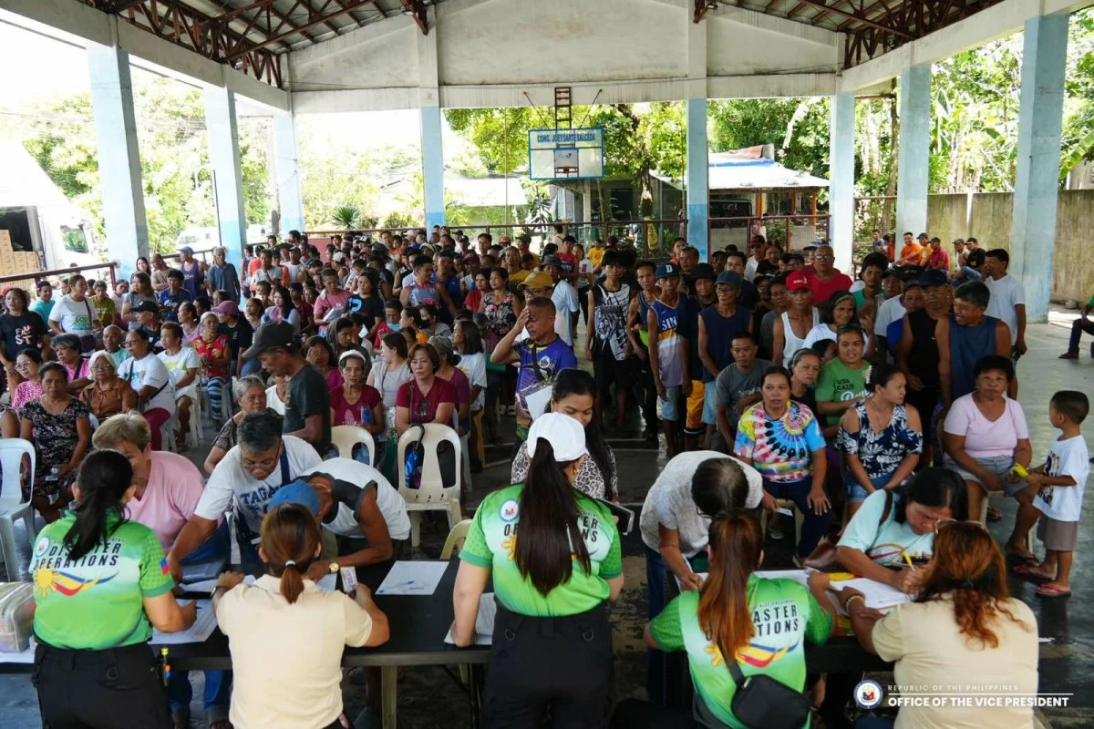 Families staying in evacuation centers receive food packs, hygiene kits, and other essential supplies as part of the OVP’s three-day relief operations in the Bicol Region. (Photo from OVP)