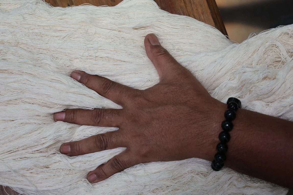 PRESERVING TRADITION — Undyed pure cotton thread.